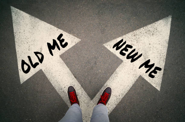 NEW ME versus OLD ME, dilemmas concept NEW ME versus OLD ME written on the white arrows, dilemmas concept. drug rehab stock pictures, royalty-free photos & images