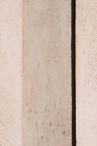 Vertical plaster on wall stock photo