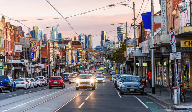 A very busy Sydney Road in Brunswick in the early evening light stock photo