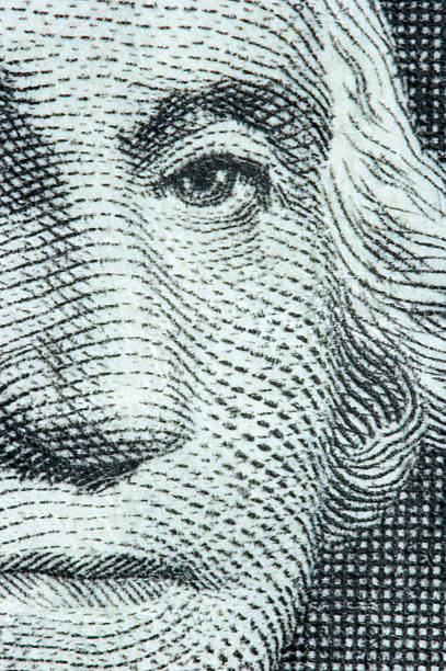 Very close-up image of George Washington on a dollar bill stock photo