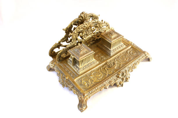 A Very Ornate Antique Gold Metal Ink and Stationary Stand stock photo