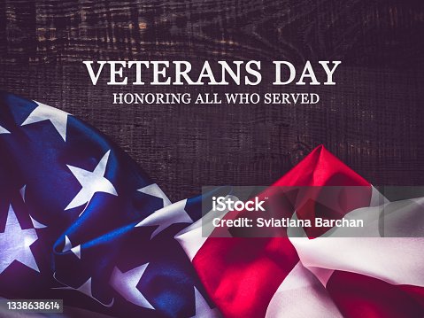 istock Veterans Day. American Flag lying on the table 1338638614