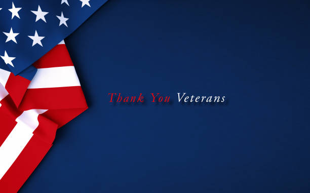 Veteran's Day Concept - Thank You Veterans Message Sitting Over Dark Blue Background Amidst Rippled American Flags Thank you Veterans message written over dark blue background amidst rippled American flags. Horizontal composition with copy space. Directly above. US President's Day concept. memorial day background stock pictures, royalty-free photos & images