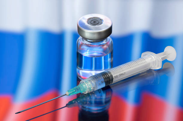Vial ampoule vaccine for Corona Virus Covid-19 with Flag of Russia stock photo