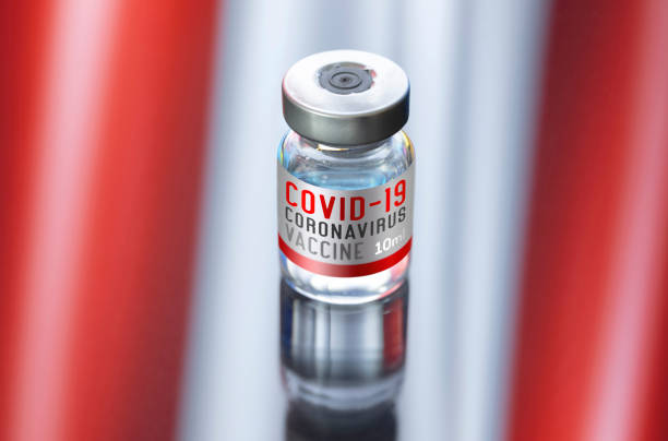Vial ampoule vaccine for Corona Virus Covid-19 with national Flag of Austria stock photo
