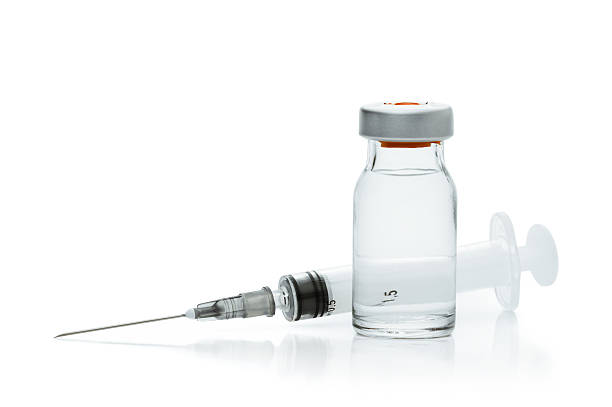 Vial and Syringe "Vial and Syringe, Isolated on white" medical injection stock pictures, royalty-free photos & images