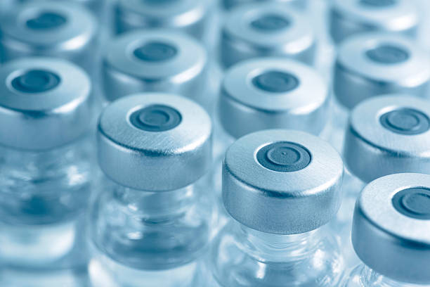 vials of medicine or vaccine - flaska bildbanksfoton och bilder