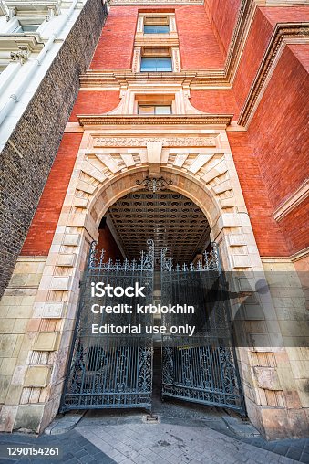 istock Victoria and Albert art museum Henry Cole wing building entrance through cast iron gate 1290154261