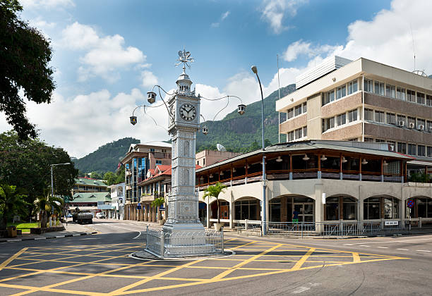victoria, seychelles intersection with clock tower - saat kulesi stok fotoğraflar ve resimler