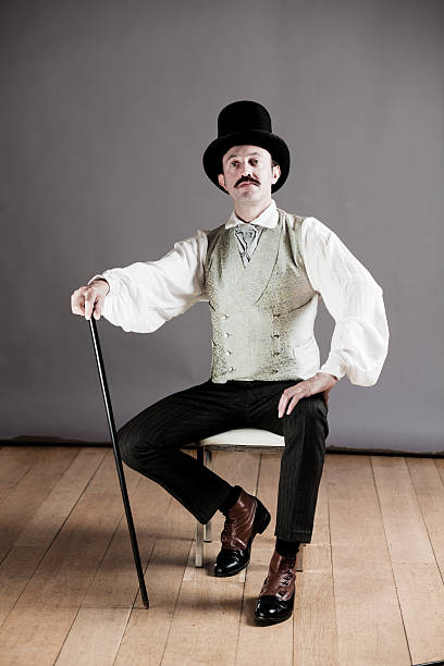 Victorian Man Man in victorian clothing posing for a photograph period costume stock pictures, royalty-free photos & images