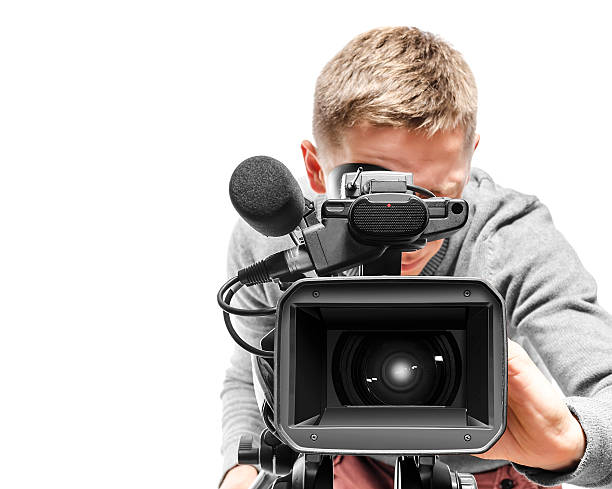 Video camera operator Video camera operator isolated on white background camera operator stock pictures, royalty-free photos & images