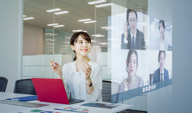 Video conference concept. Teleconference. Webinar. Online seminar. e-Learning. Video conference concept. Teleconference. Webinar. Online seminar. e-Learning. online meeting asian stock pictures, royalty-free photos & images