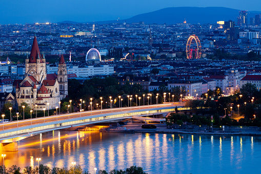 Vienna, aerial view at night, with danube and cityscape