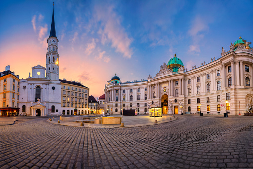 Cityscape image of Vienna, Austria with St. Michael's Square during sunrise.