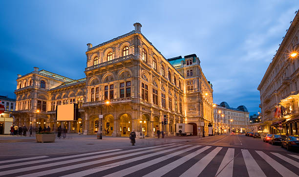 Vienna Opera House The Opera House in Vienna in the evening vienna austria stock pictures, royalty-free photos & images