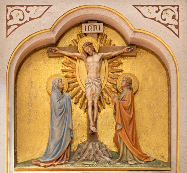 Vienna - The relief of Crucifixion on altar of Herz Jesu church stock photo