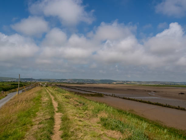 View along the South West Coastal Path near Horsey Island, Braunton Marsh, North Devon. View along the South West Coastal Path near Horsey Island, Braunton Marsh, North Devon. No people. braunton stock pictures, royalty-free photos & images