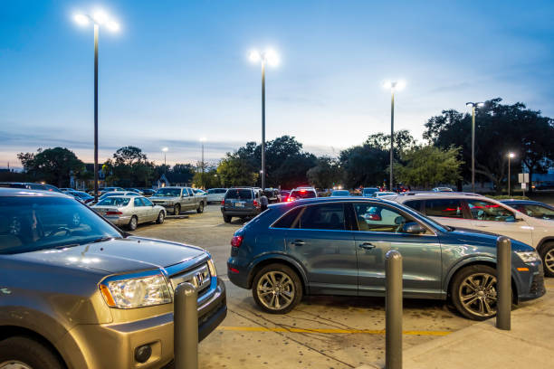 View at dusk of the parking area of a shopping center, New Orleans stock photo