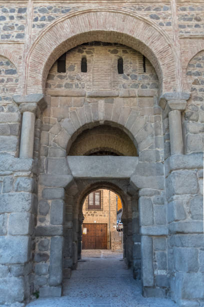 View at the Puerta de Bisagra (originally Bab al-Saqra, also called Puerta de Alfonso VI) a monumental moorish main city gate entrance on Toledo fortress stock photo