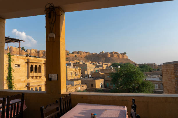 View from a hotel - Jaisalmer Fort or Sonar Quila or Golden Fort. A "living fort" - made of yellow sandstone. UNESCO world heritage site at Thar desert. stock photo