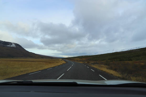 View from inside a car while driving on a Road 95 (Skriddals- og Breiddalsvegur) in eastern Iceland stock photo