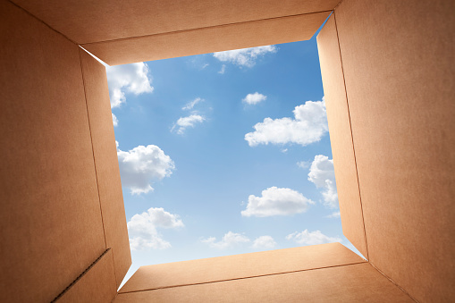 Sky seen from through inside box.