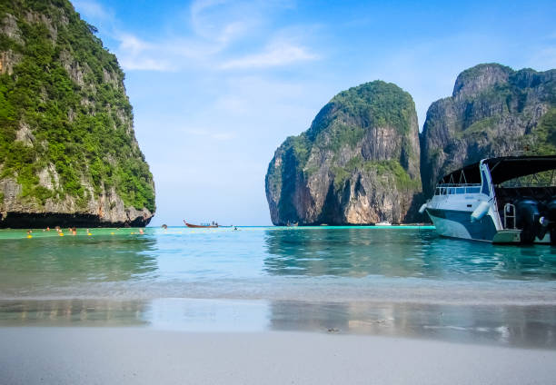 View from Maya Bay Beach with speedboat in foreground stock photo
