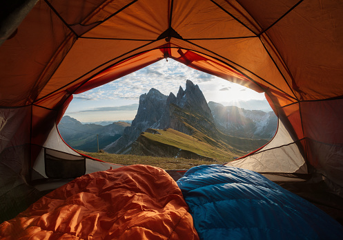 View from tent to the mountain. Sport and active life concept