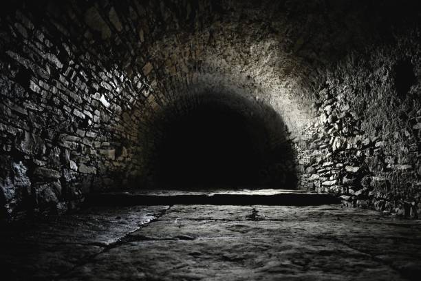 View into the old spooky underground Spooky underground, old historical cellar basement photos stock pictures, royalty-free photos & images