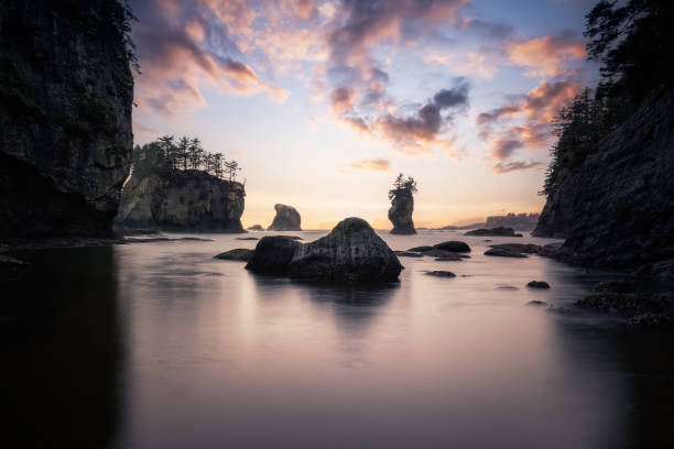 View of a scenic landscape at the Ocean Coast. Dreamy Magical View of Colorful Sunset on the pacific ocean coast. Taken at Cape Flattery in Neah Bay, West of Seattle, Washington, USA. Nature Background neah bay stock pictures, royalty-free photos & images