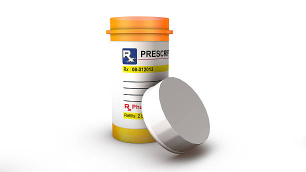 View of a single empty pill bottle View of a single empty pill bottle xanax pill stock pictures, royalty-free photos & images