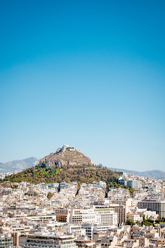 View of Athens city buildings and Lycabettus Hill