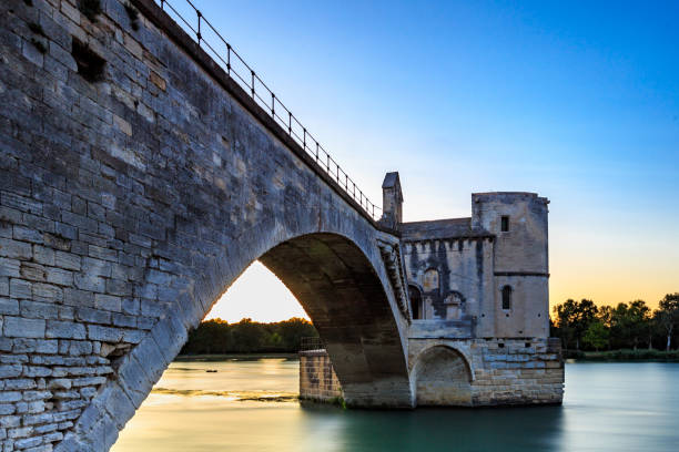 View of Avignon bridge, the medieval Saint Benezet Bridge at sunset, Avignon, southern France. stock photo