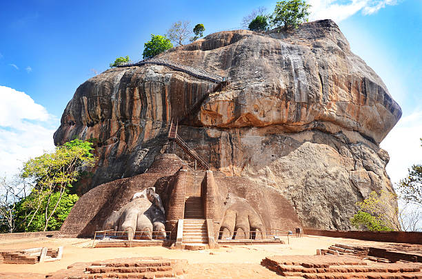 View of base of Sigiriya rock fortress in Sri Lanka The 8th wonder of the world, Sigiriya rock fortress Sri Lanka dambulla stock pictures, royalty-free photos & images
