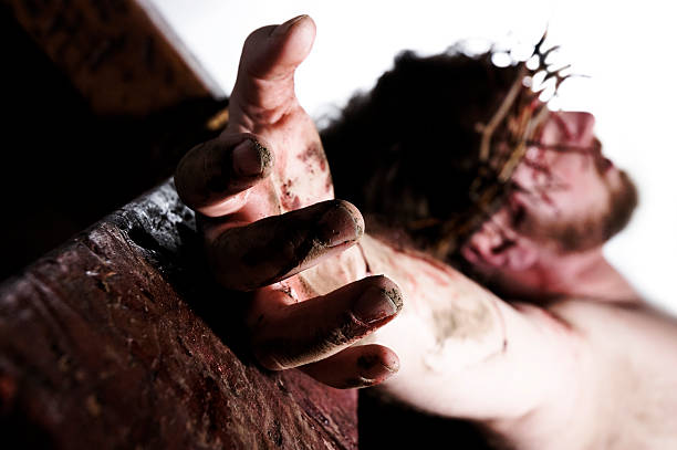 View of Christ's hand nailed to wood beam at crucifixion  good friday stock pictures, royalty-free photos & images
