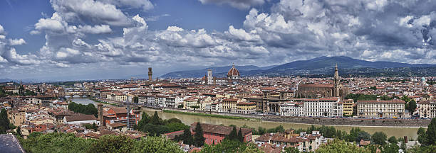 view of Florence Italy with Ponte Vecchio, Palazzo Vecchio, Cathedral stock photo