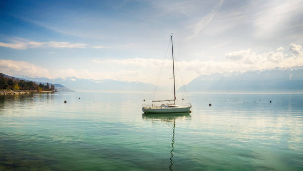 View of Lake Geneva with One Boat, Lausanne, Switzerland, stock photo