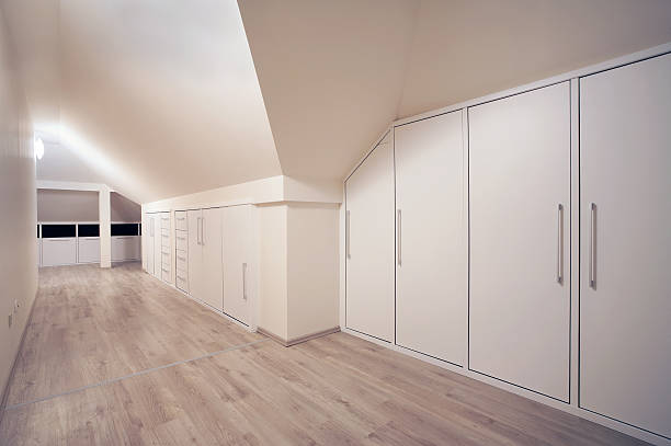 View of large wardrobe area in home with drawers and closets stock photo