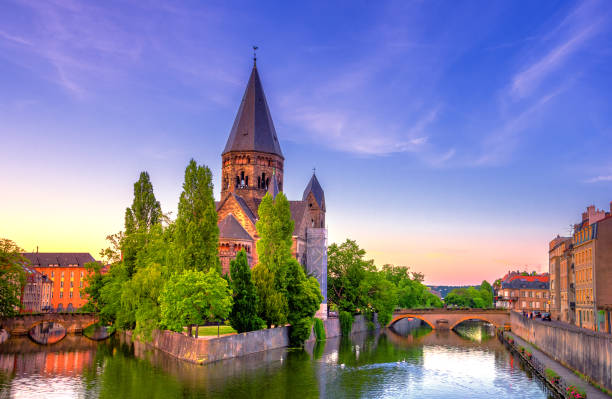View of Metz with Temple Neuf at the Moselle River, Lorraine, France View of Metz with Temple Neuf at the Moselle River, Lorraine, France lorraine stock pictures, royalty-free photos & images