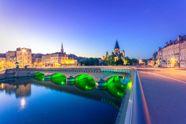 View of Metz with Temple Neuf reflected in the Moselle River, Lorraine, France stock photo