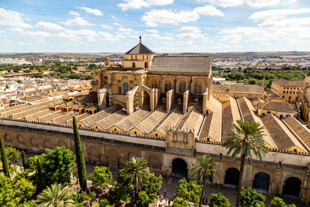 View of Mezquita, Catedral de Cordoba, from the Bell tower, the former Minaret of the Moorish mosque. Cordoba, Andalucia, South of Spain. The cathedral is a UNESCO world heritage site. View of Mezquita, Catedral de Cordoba, from the Bell tower, the former Minaret of the Moorish mosque. Cordoba, Andalucia, South of Spain. The cathedral is a UNESCO world heritage site. cordoba mosque stock pictures, royalty-free photos & images