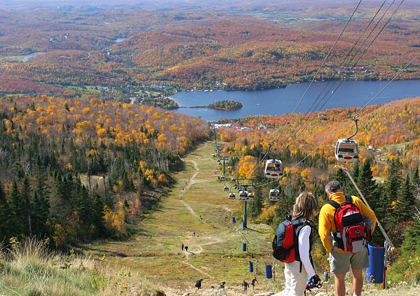 View of Mont Tremblant and cable cars during autumn stock photo