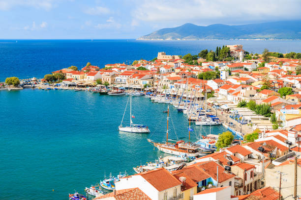 SAMOS ISLAND, GREECE - SEP 23, 2015: A view of Pythagorion port with colourful houses and blue sea, Samos island, Greece. stock photo