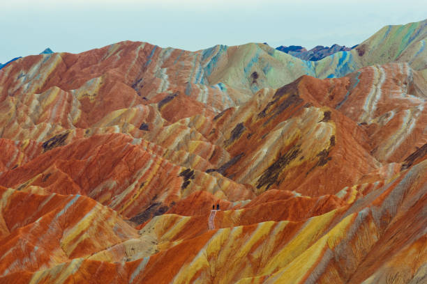 view of Rainbow Mountains in Zhangye Danxia Landform Geological Park view of Rainbow Mountains in Zhangye Danxia Landform Geological Park danxia landform stock pictures, royalty-free photos & images