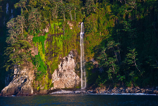 View of rocky waterfall in Cocos stock photo