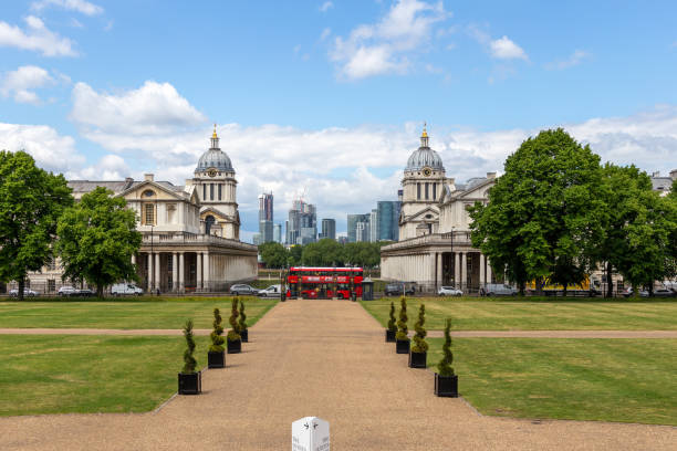 View of Royal Naval College, Greenwich, with the Canary Wharf skyscrapers in the background, from The Queen's House stock photo