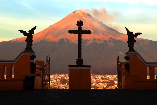 View of the active volcano Popokatepetl from the Catholic Church of St. Mary. Mexico. Cholula city.