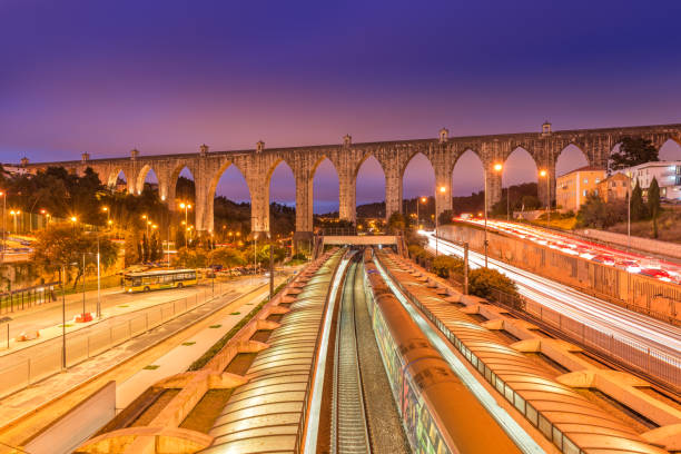 View of The Aguas Livres Aqueduct and Campolide train station, Lisbon, Portugal stock photo