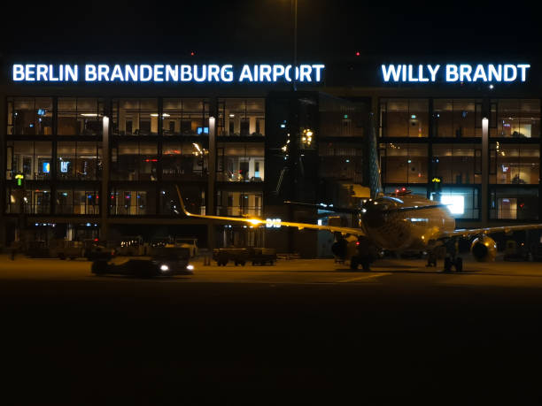 View of the Berlin Airport Terminal from the plane's porthole stock photo