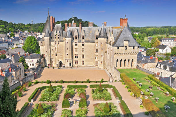 View of the castle garden and town Langeais. Loire Valley France. stock photo